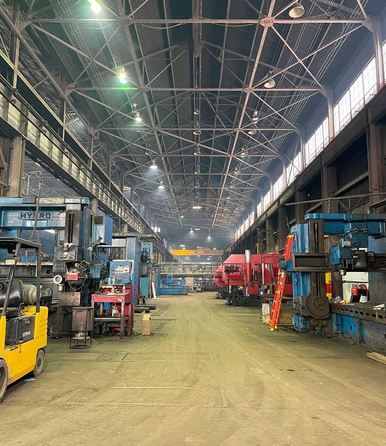 Wide interior view of a large heavy machinery manufacturing facility